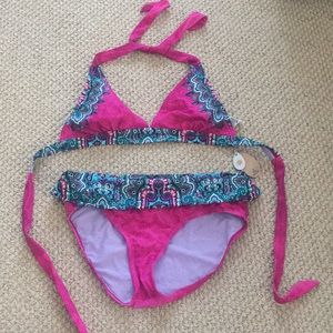 Never worn Prana size medium bikini (top & bottom)